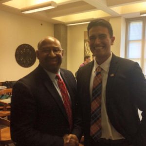 Cristian Nuno, MPA '17, shakes hand with Michael Nutter, former mayor of Philadelphia.